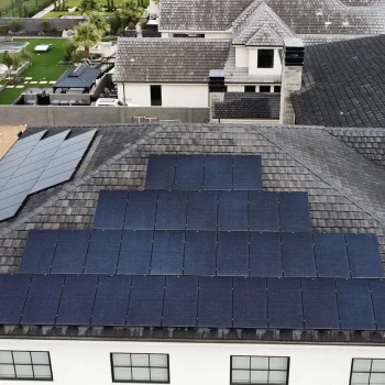 Solar panels installed on low pitch roof by stout roofing in southern utah.