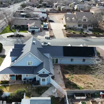 Home in southern utah with new solar panels installed by stout roofing.