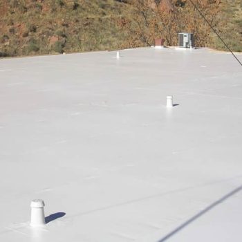 Flat roofing for commercial building and foam sealant by stout roofing.