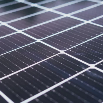 Close up of photovoltaic cells on solar panel installed by stout roofing.